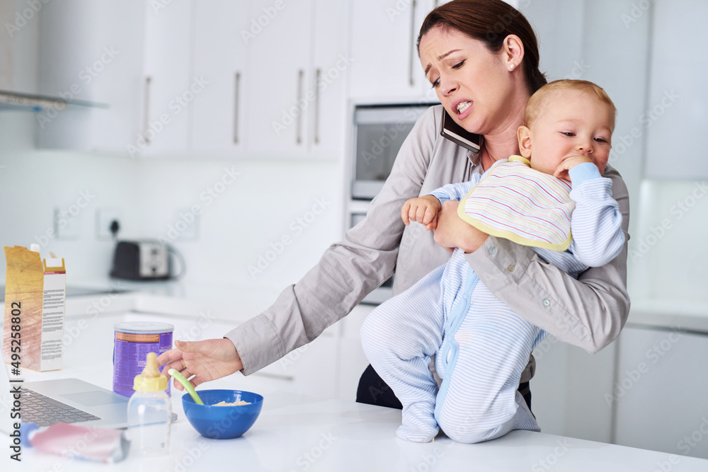 Moments in motherhood. Shot of a mother and her baby boy at home.