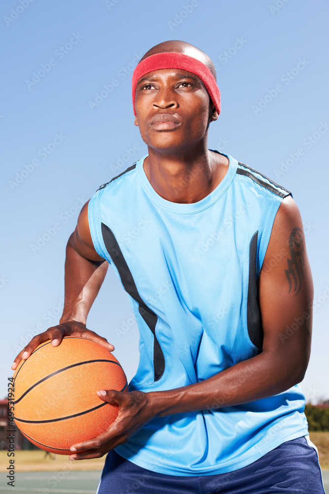 Ive got my goals in sight. A young basketball player looking determined.