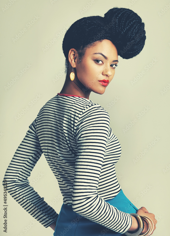 Glamour is a state of mind. Shot of a fashionable young woman posing in the studio.