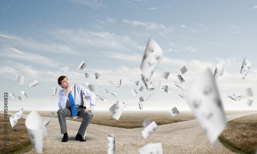 Young businessman sitting on an office chair