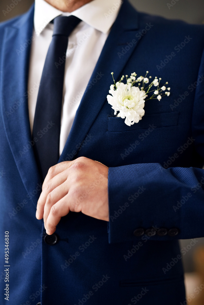 Dressed for the occasion. Shot of an unrecognizable and stylish bridegroom on his wedding day.