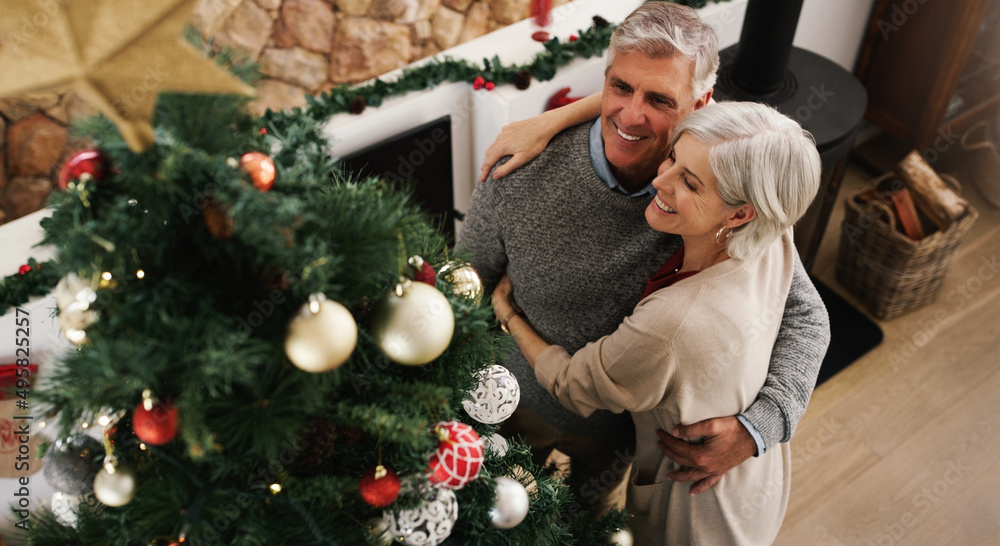 Love and togetherness, the perfect ingredients for a great Christmas. Shot of a happy senior couple 