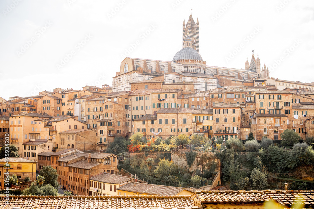 Cityscape of Siena town with Duomo cathedral in Tuscany region of Italy. Concept of visiting italian