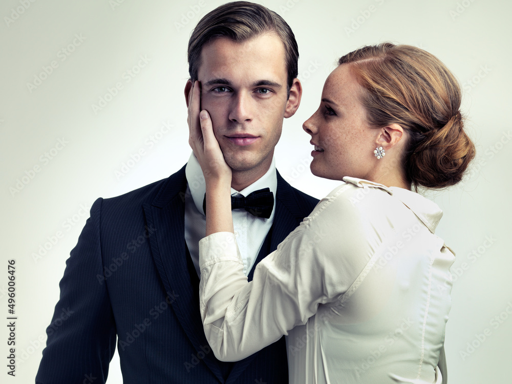 He makes them weak at the knees. A cropped studio portrait of a dapper young man with a beautiful gi