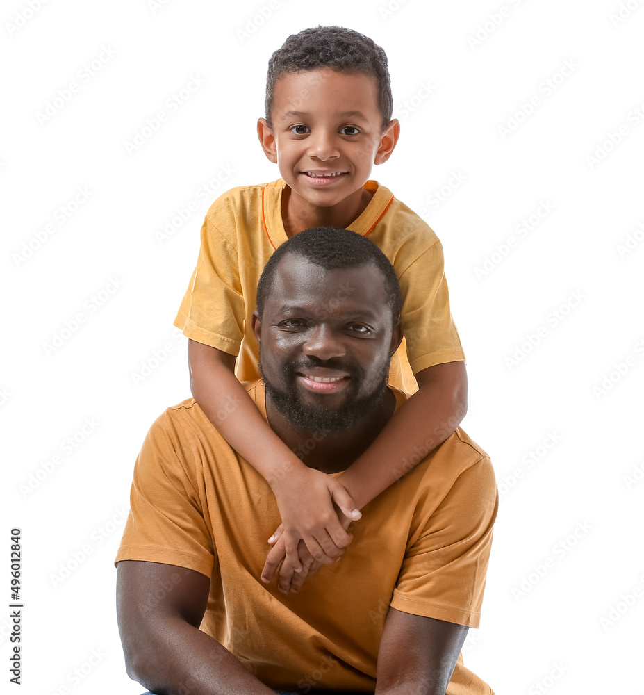 Portrait of African-American man with his little son on white background