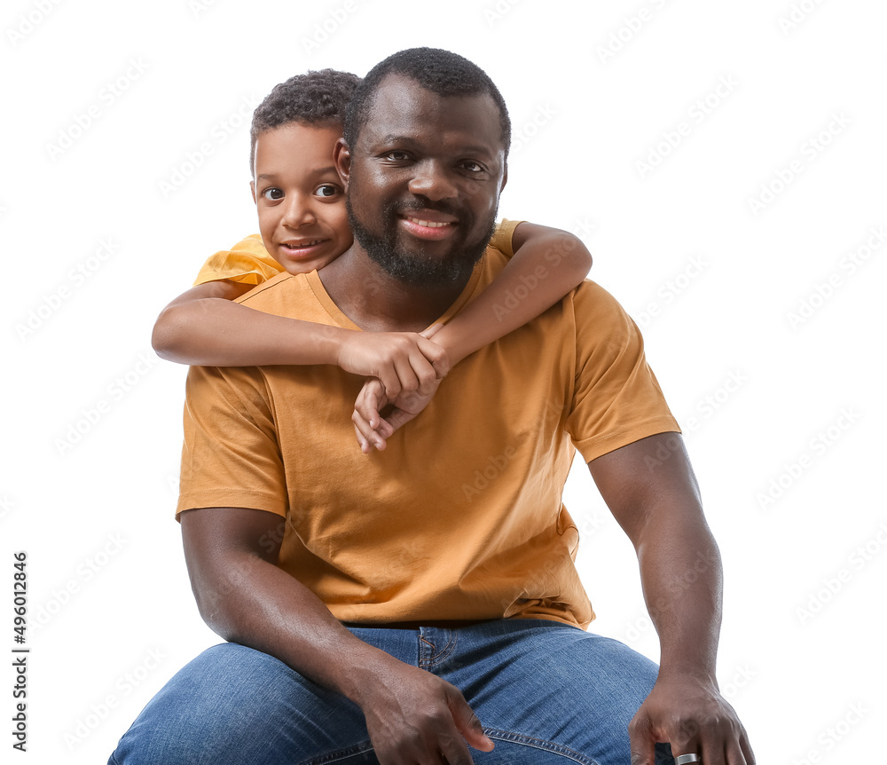 Portrait of African-American man with his little son on white background