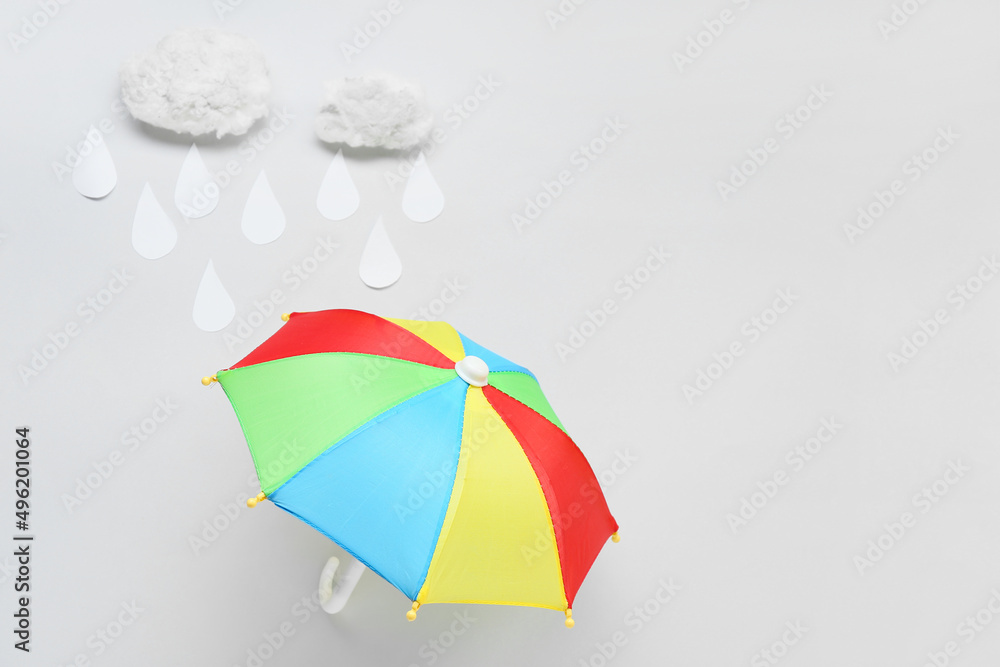 Creative composition with umbrella on white background