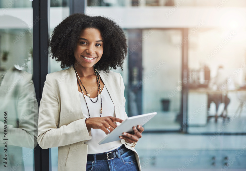 Make it your business to be tech savvy and industrious. Portrait of a young businesswoman smiling an