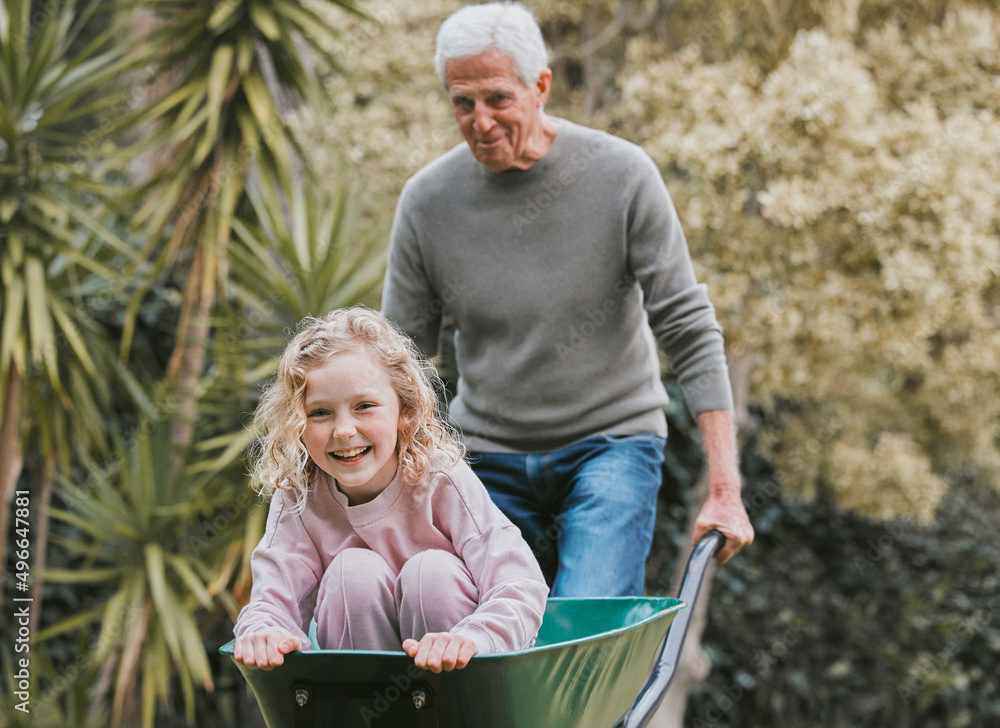 Never let your inner child grow old. Shot of an adorable little girl having fun with her grandfather