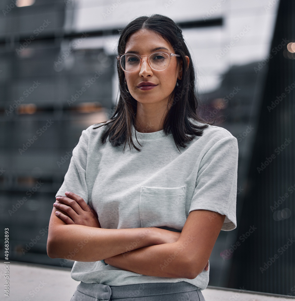 Determined to make it no matter the cost. Shot of an attractive young businesswoman standing alone i