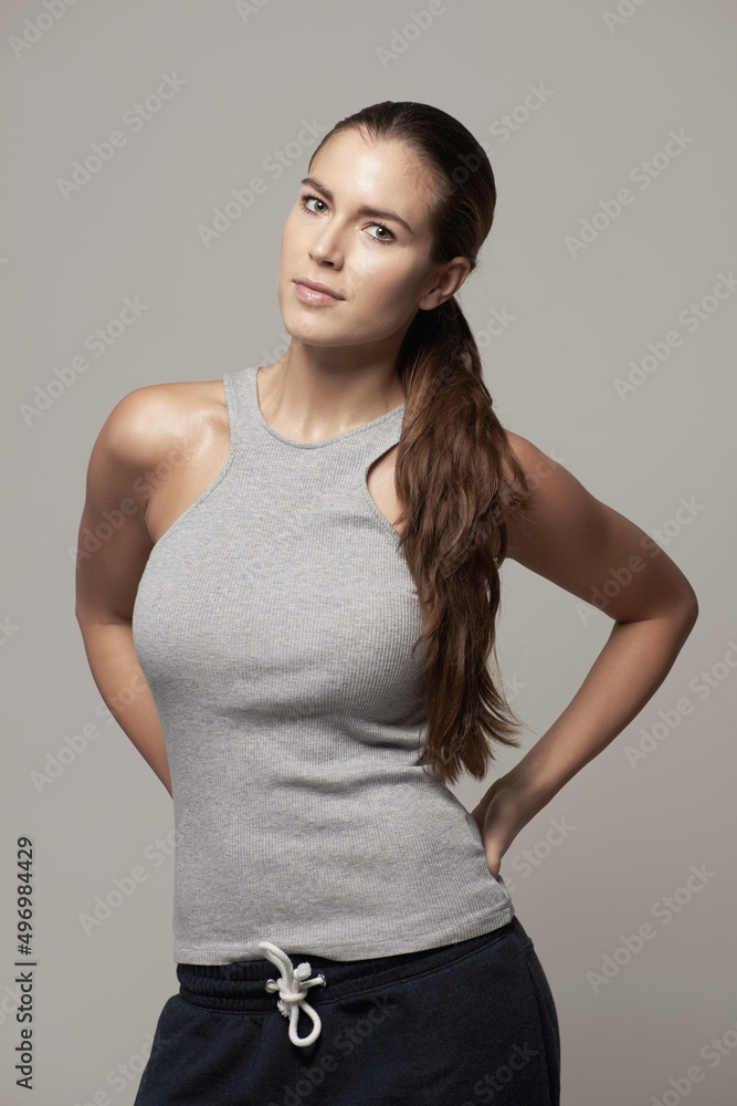 Stoked for a workout. Studio portrait of a fit young woman in exercise clothing.