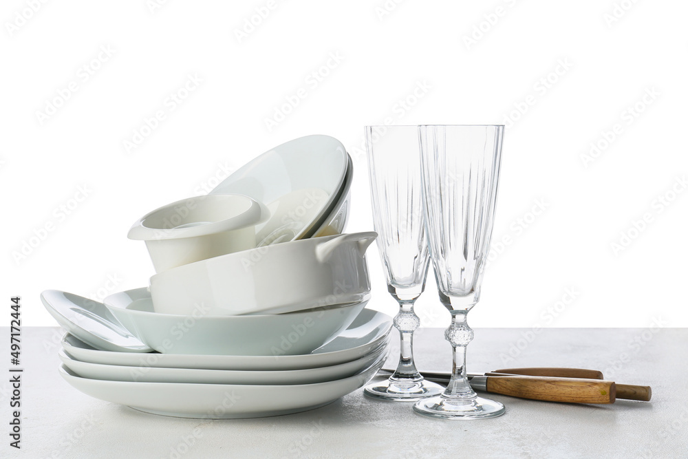 Set of clean tableware isolated on white