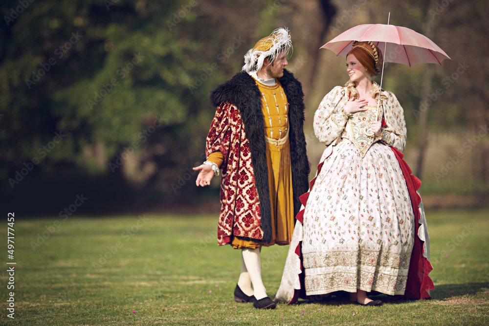 You should walk on royal clouds. Shot of a royal couple spending time together at the gardens.