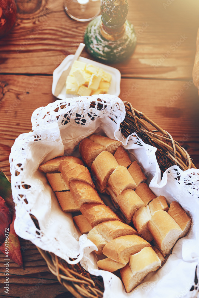 Give us this day our daily bread. Cropped shot of a dining table with food on it.