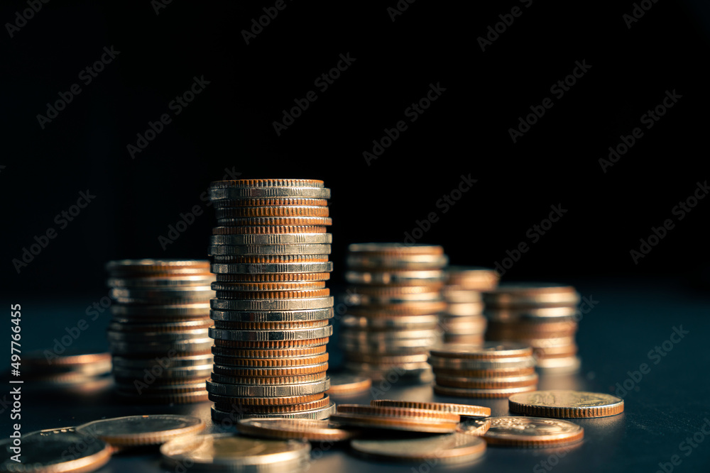 Pile of gold coins stack in finance treasury deposit bank account for saving . Concept of corporate 