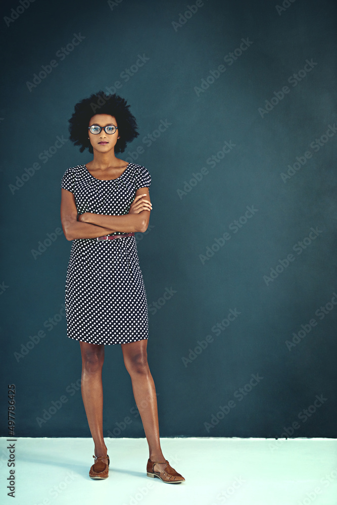 Shes full of confidence. Portrait of a confident young businesswoman standing with her arms folded i