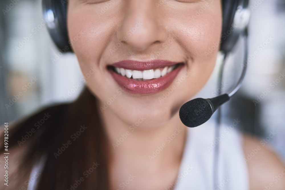 Smiles keep the customers happy. Cropped shot of a cheerful unrecognizable businesswoman talking to 