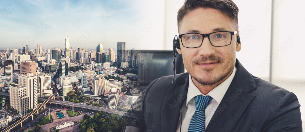 Business people wearing headset working in office to support remote customer or colleague. Call cent