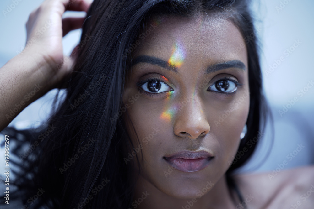 My skin has been looking so flawless lately. Shot of a young woman looking at the camera in a studio