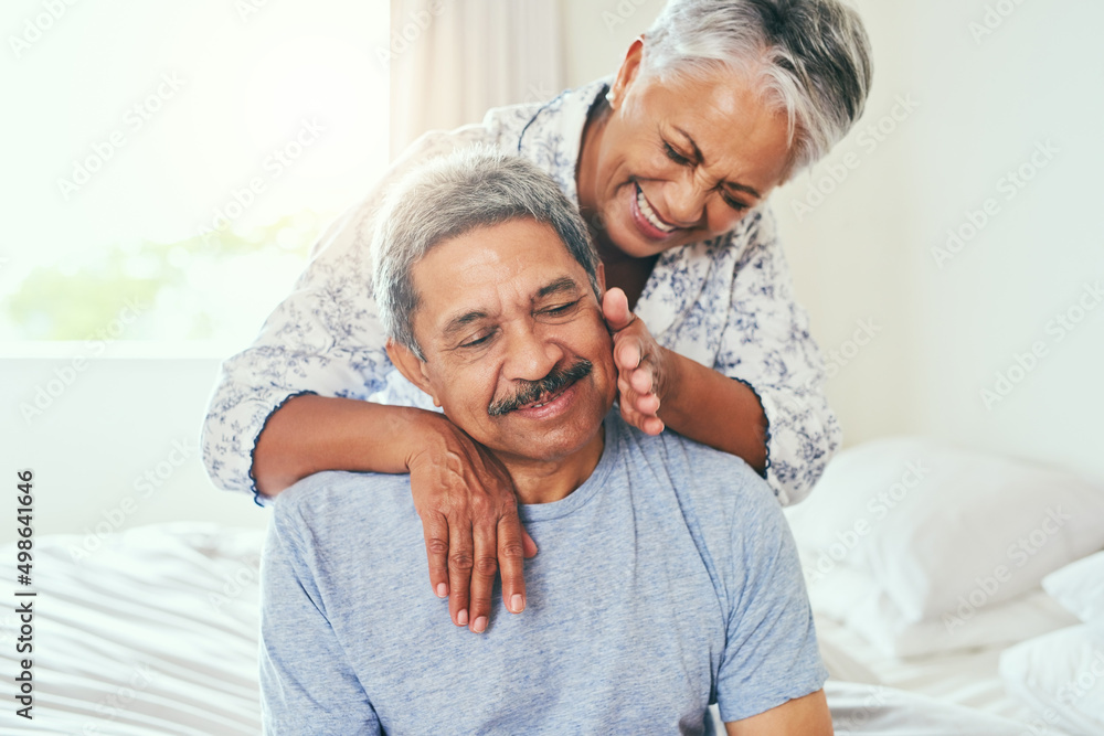 Wow Im getting spoiled today. Shot of a cheerful mature couple holding each other while being seated