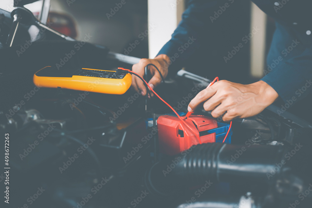 Car service, repair, maintenance concept. Auto mechanic working