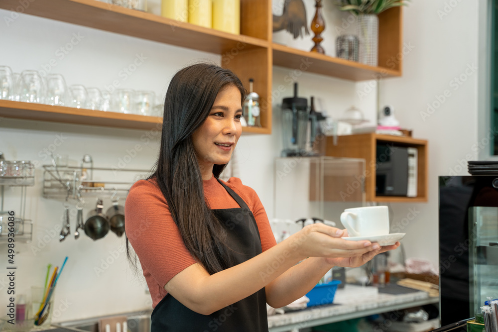 Barista in an apron making coffee in a coffee shop,Barista Cafe Coffee Grinder Pour Professional Con