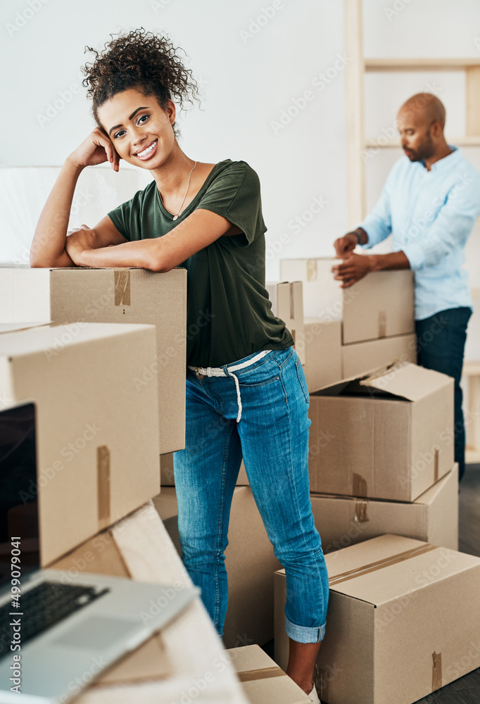 Its a big step, but we couldnt be happier. Portrait of a young couple moving house.