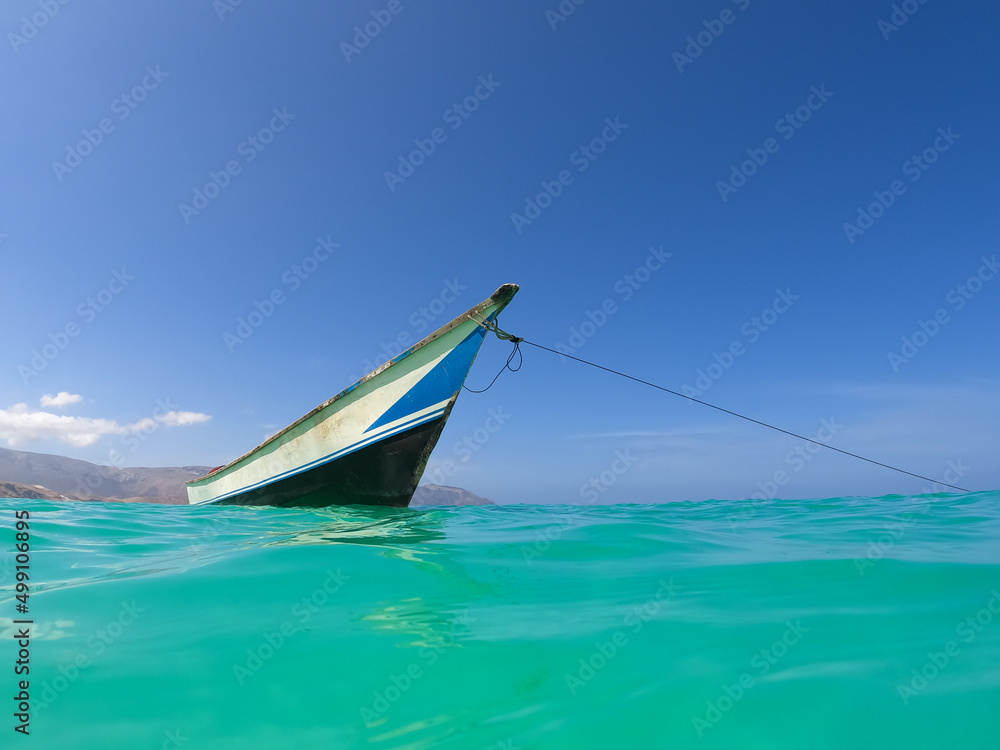 Fishing boat moored off the coast of Socotra. Socotra, Yemen.