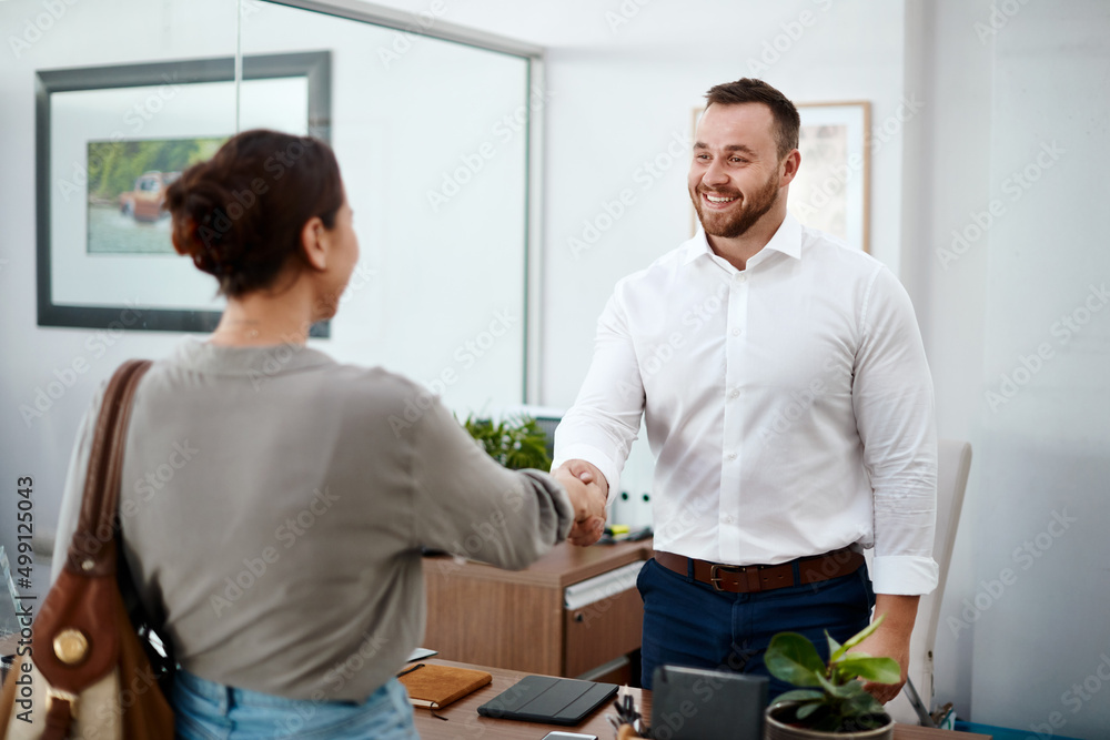 Do you have a vehicle in mind. Shot of a businessman shaking hands with his customer.