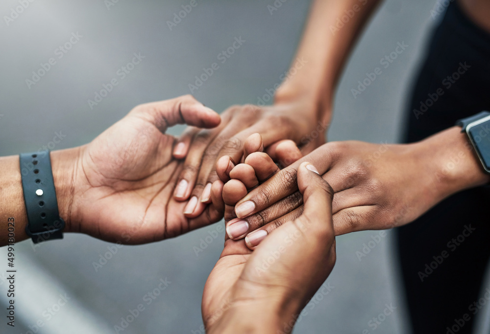 Ive got you.... High angle shot of an unrecognizable sporty young couple holding hands while standin