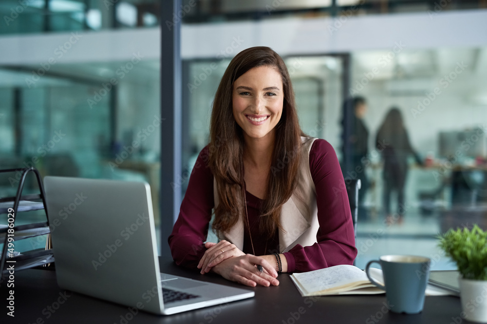 Today you can start a business with a few keystrokes. Shot of a businesswoman sitting at her desk wi