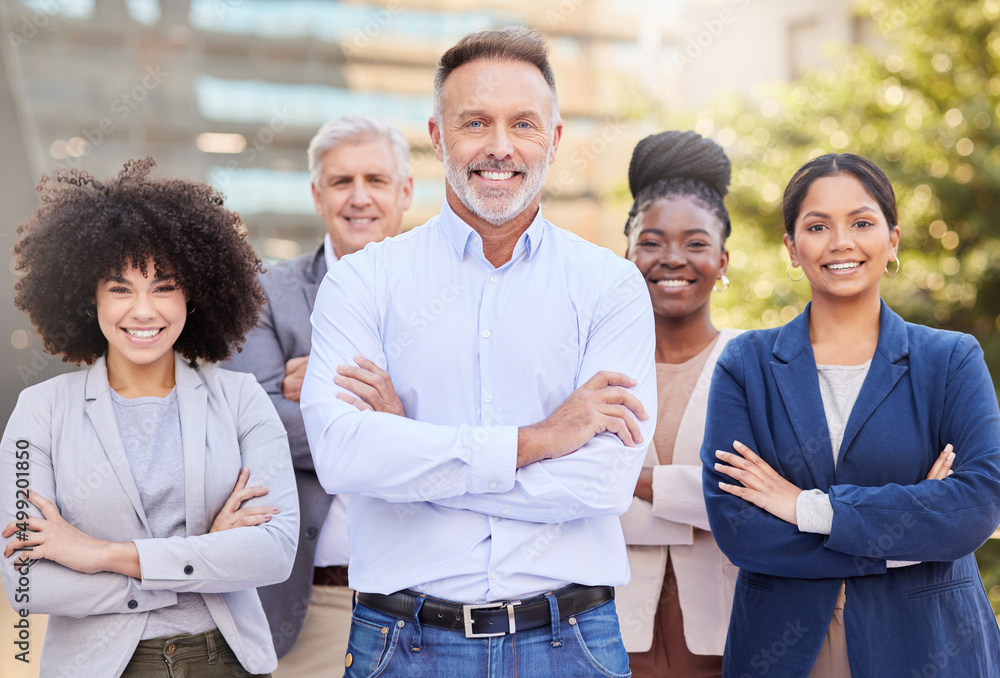 Creating an impact in the business world together. Shot of a diverse group of businesspeople standin