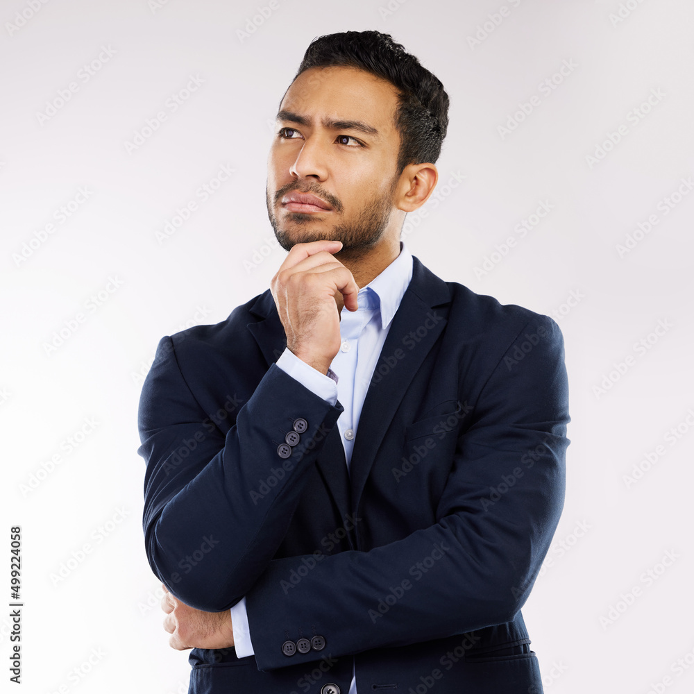 Ill need some more time to consider your offer. Studio shot of a young businessman looking thoughtfu