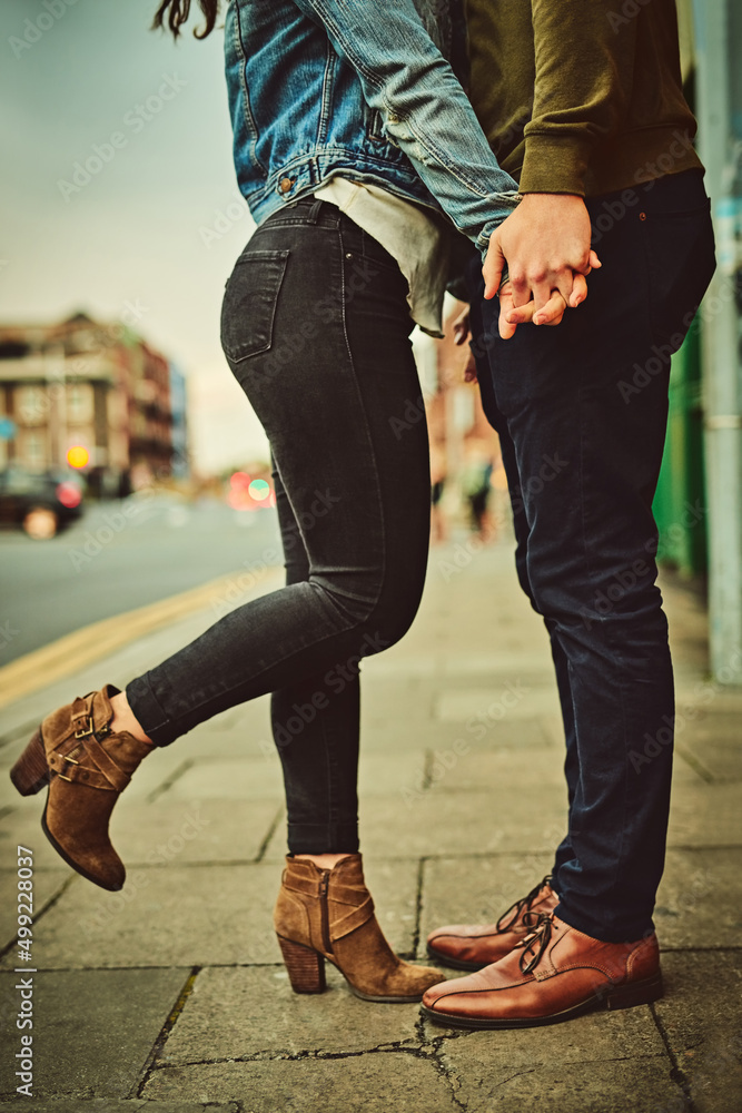 Flaunting the strength of their relationship. Cropped shot of an unrecognizable couple out on a date