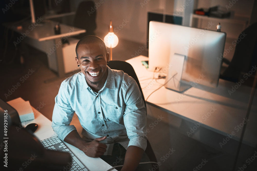 Im determined to beat this deadline. High angle portrait of a handsome young male designer working o