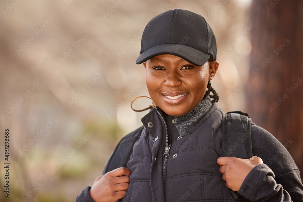 A day in nature is just what I need. Shot of a young woman enjoying a day in nature.