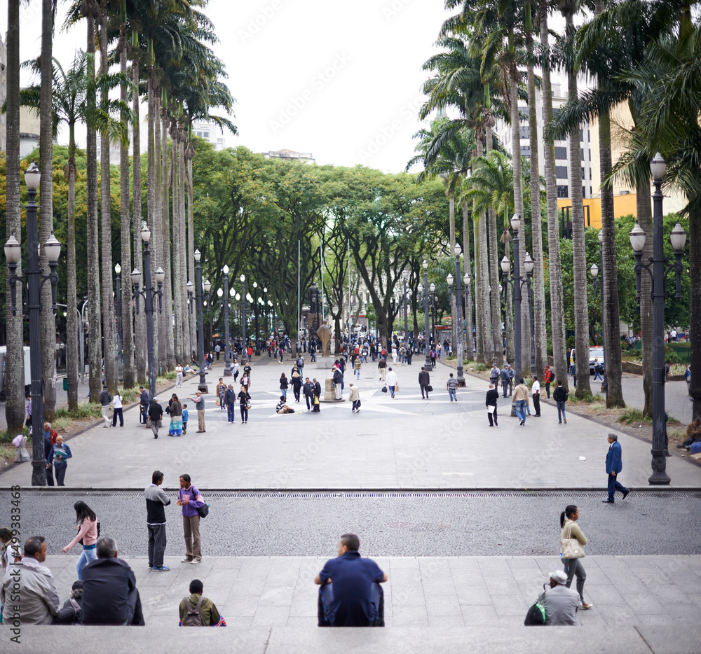 Midday urban meanderings. Shot of a busy square.