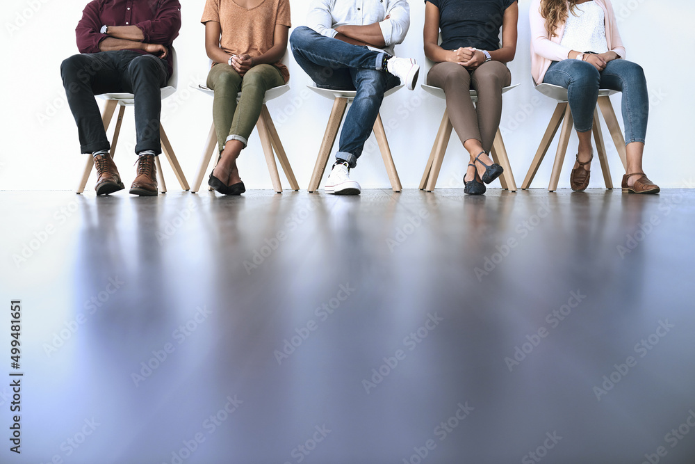 All they need is an opportunity. Shot of a group of diverse people waiting in line to be interviewed