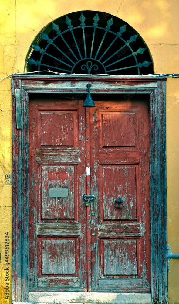 An old rustic door. A rustic door.