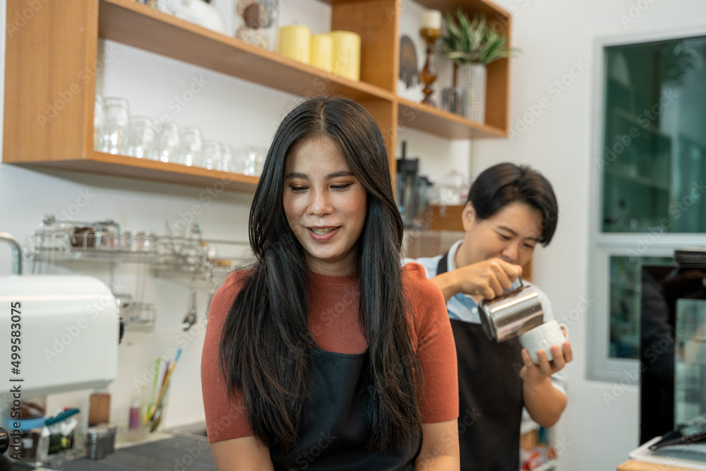 two women drinking coffee