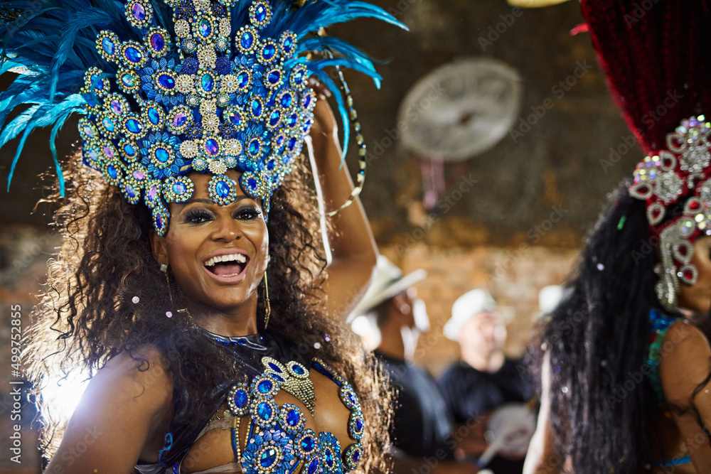 Get ready for an electrifying performance. Portrait of a samba dancer performing in a carnival.