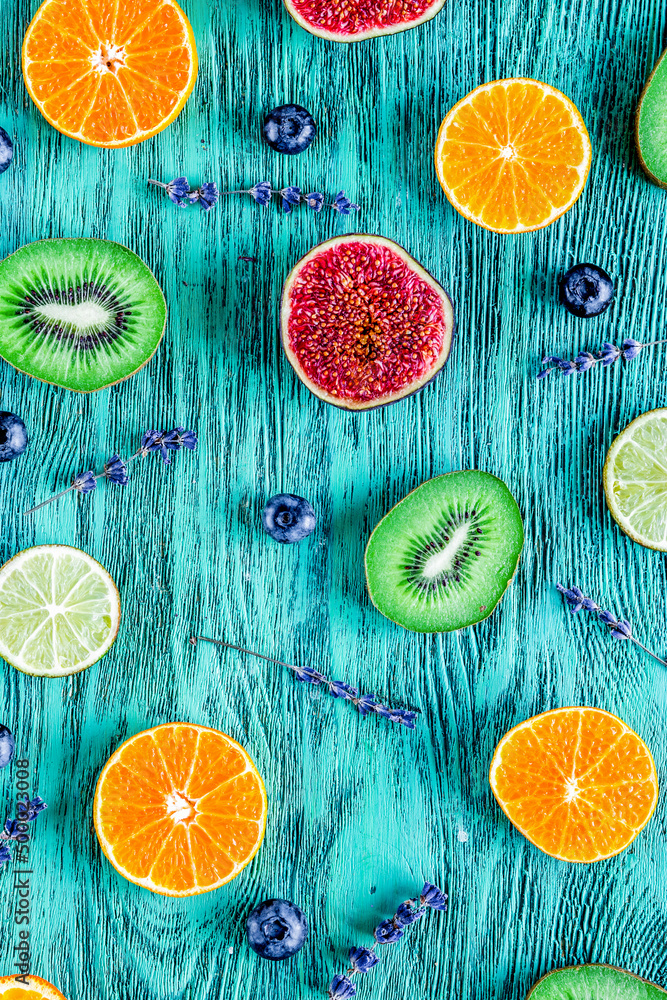 fruit design on blue rustic desk background top view pattern