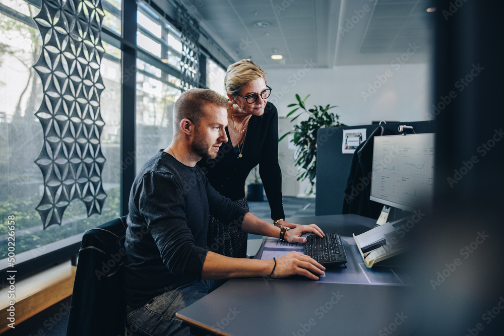 Colleagues working in office