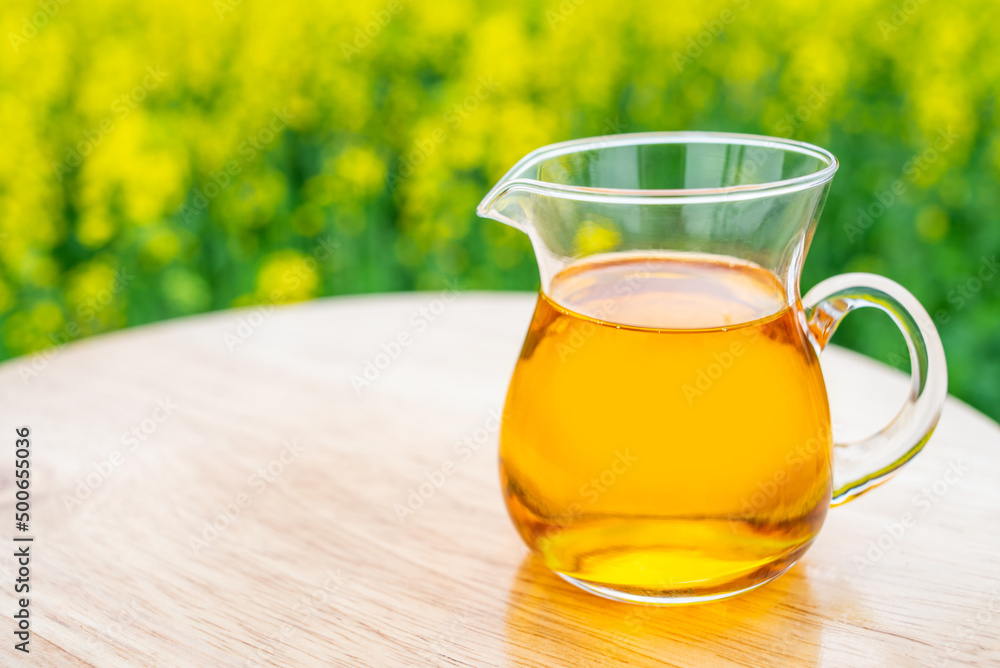 A bottle of golden rapeseed oil