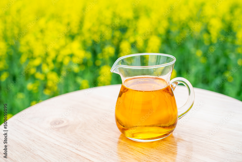 A bottle of golden rapeseed oil