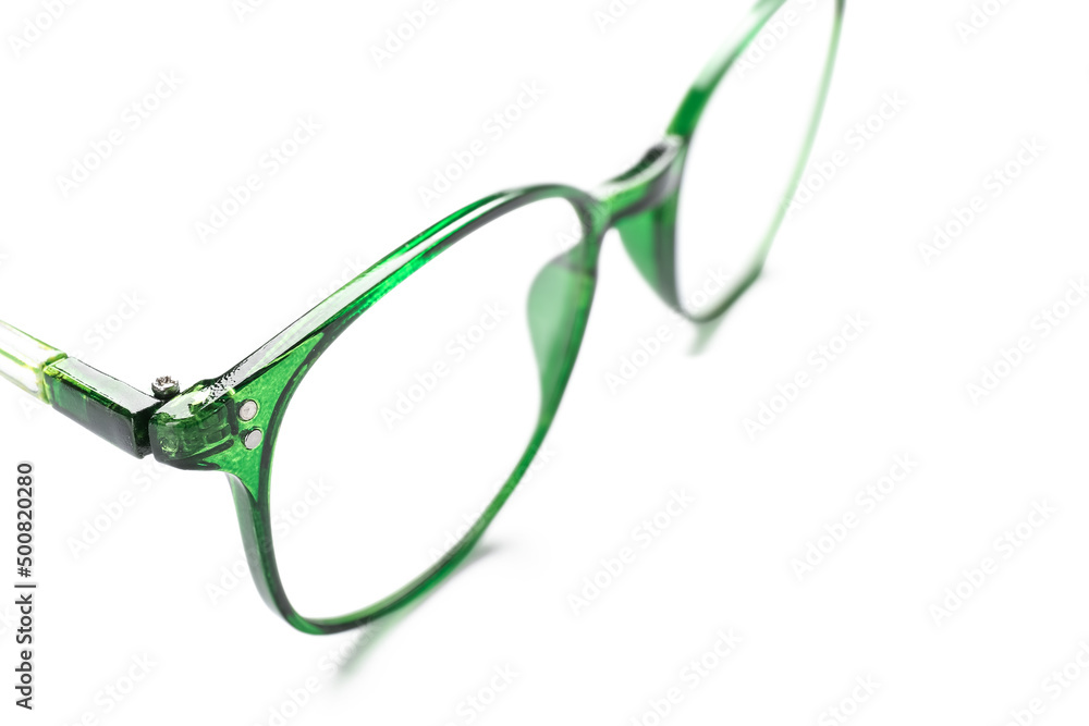 Stylish plastic eyeglasses on white background, closeup