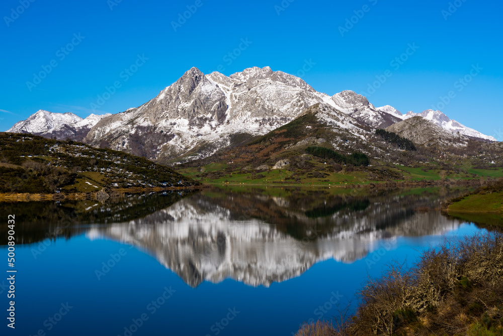 Winter Morning and reflection of  mountains at Riaño reservoir in Spain