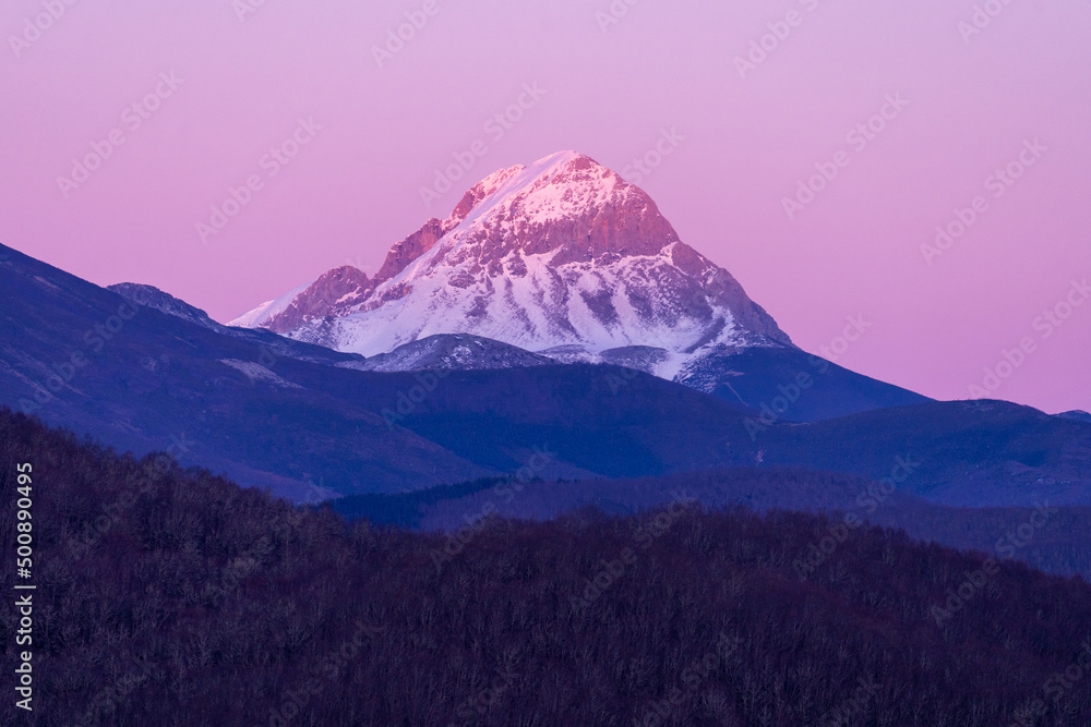 Sunset over mountains at Riaño reservoir in Spain