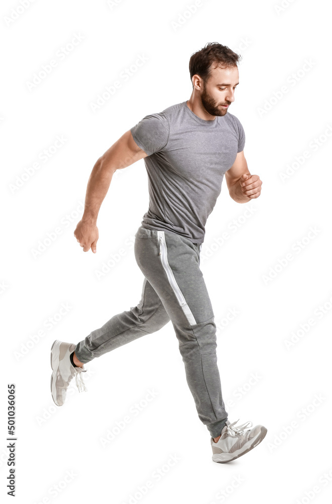 Sporty male runner on white background