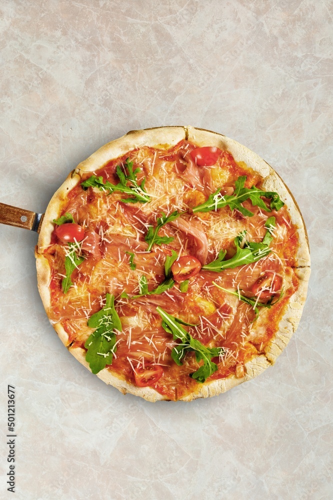 Italian pizza with on wooden round desk.